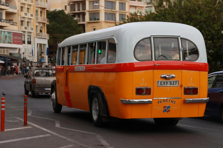 a bus driving down the street in traffic