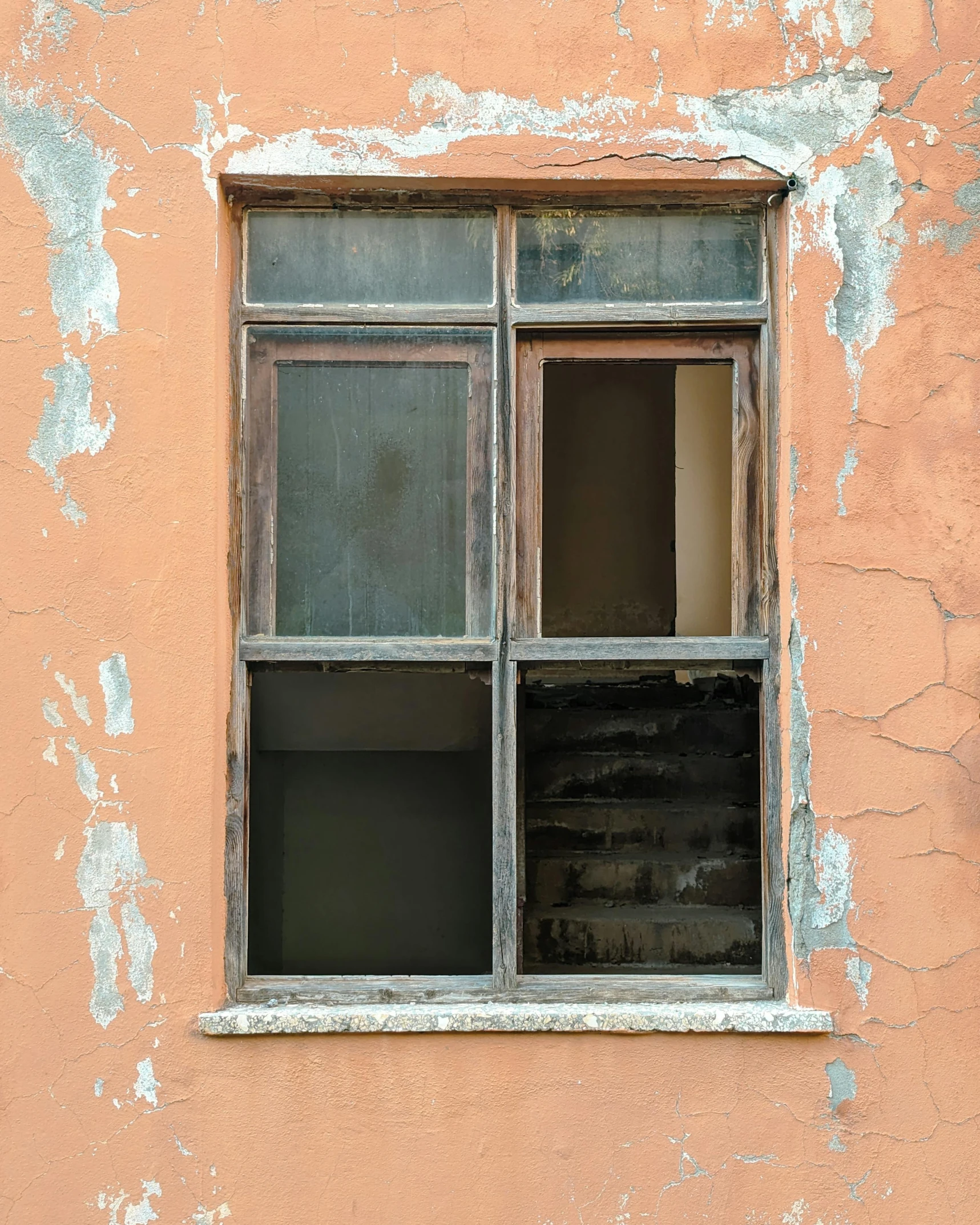 a small window that is on the side of a building