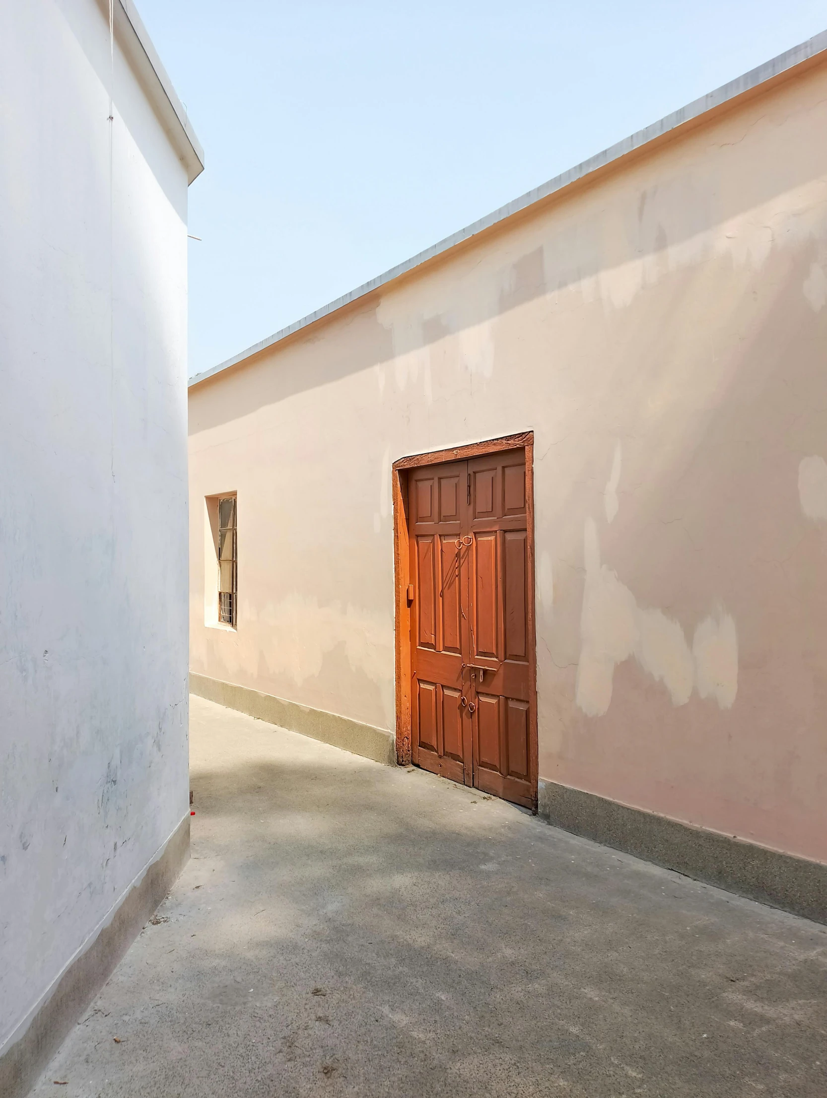 a doorway is near the wall in front of a doorway