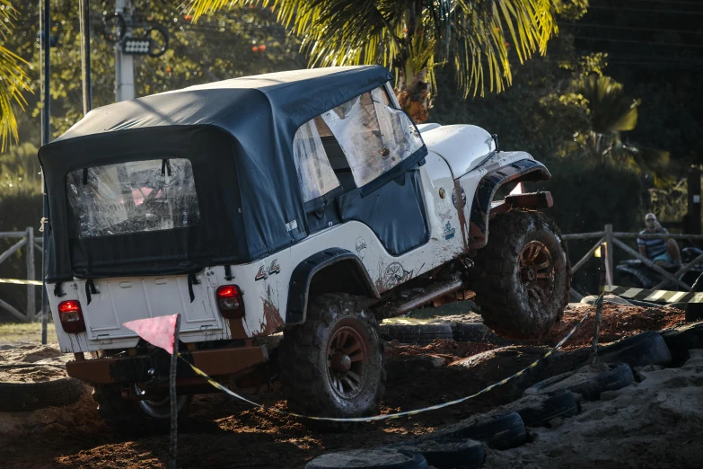 a truck that is being worked on by a man