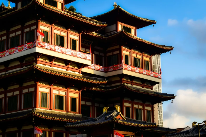 an ornate chinese style building with many windows