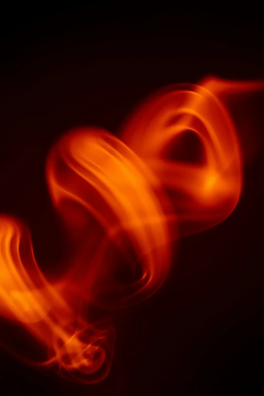 a blurry fire po with an orange fire - swirl