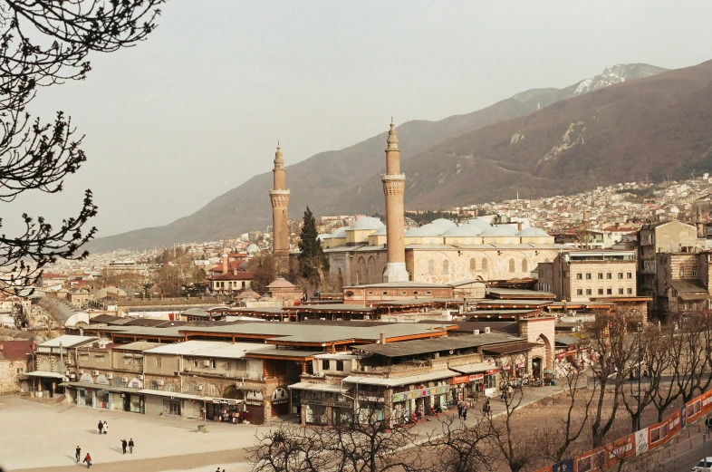 an elevated view of the old city with mountains
