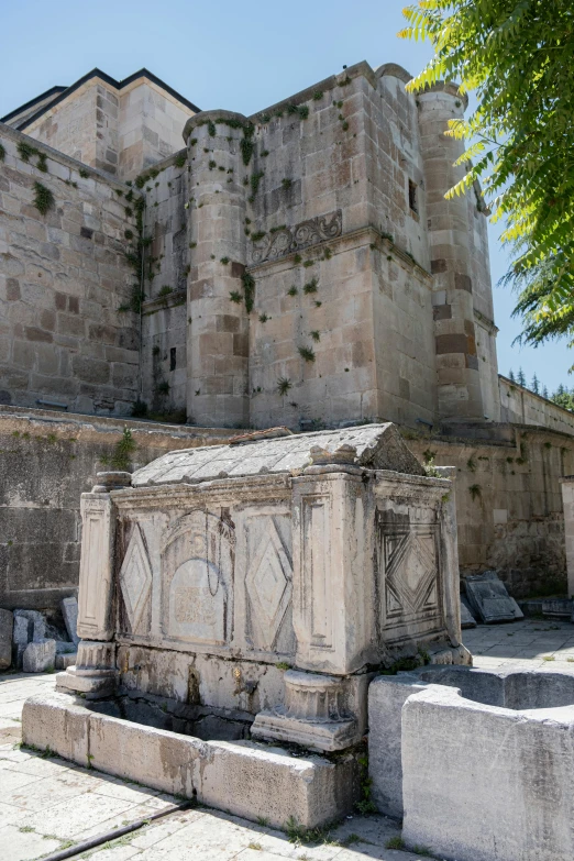 a castle sitting on top of a cement block