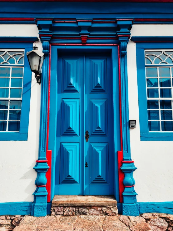 a house is blue, white and red