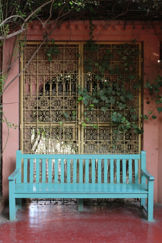 an image of a wooden bench in front of the door