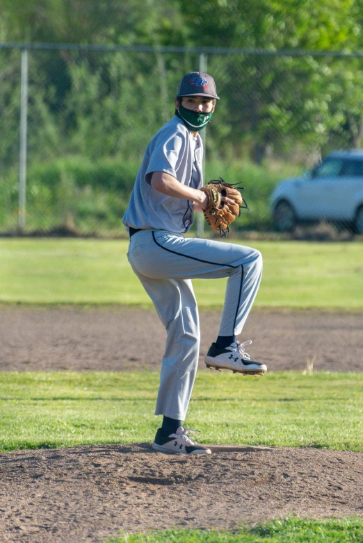 a baseball player is trying to catch the ball