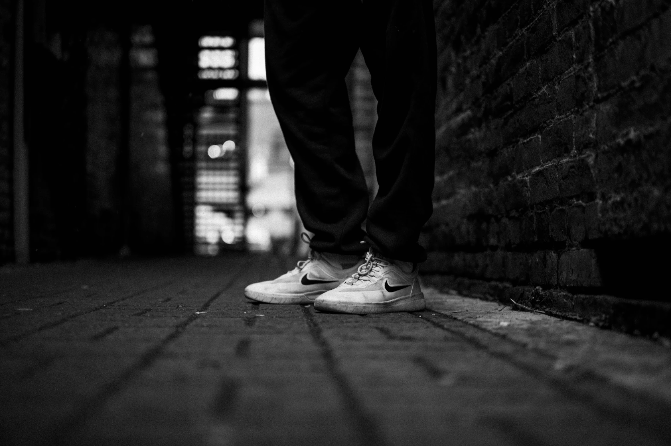 a person standing on top of a hardwood floor