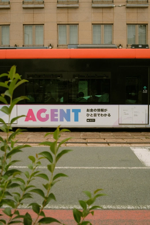 the electric tram has large doors on it's side