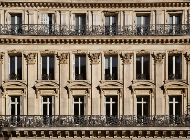 an ornate building with balconies and windows