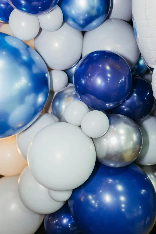 the balloons are white and blue in color