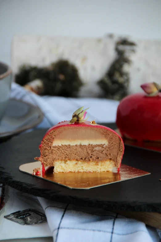 some fancy cakes that are being served on the table