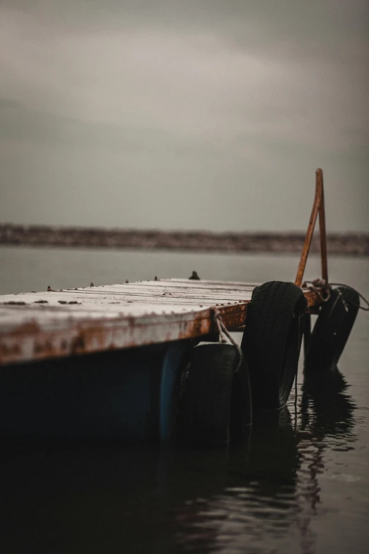 the bottom of the boat is partially submerged