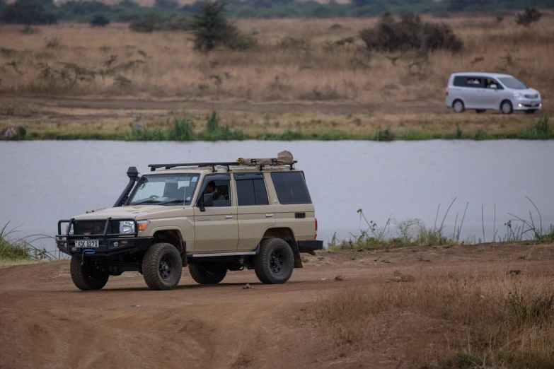 a small four wheeled vehicle on a dirt road