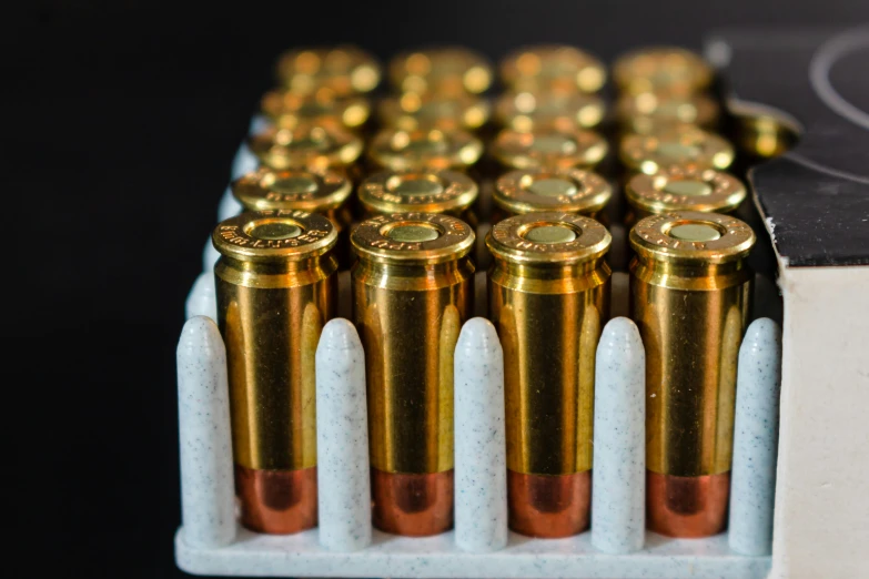 a bunch of bullet sguns sitting on a table