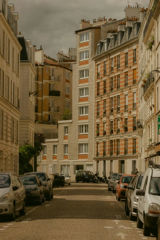 an alley between two tall buildings in a foreign country