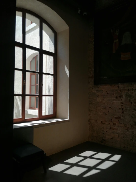 a room with a sunny light coming in through the window