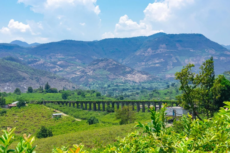 a view of a bridge that leads to a river