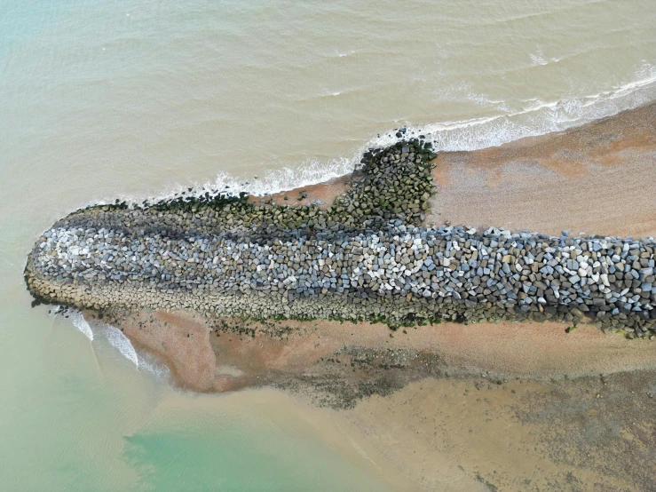 aerial s of sand and water on the beach