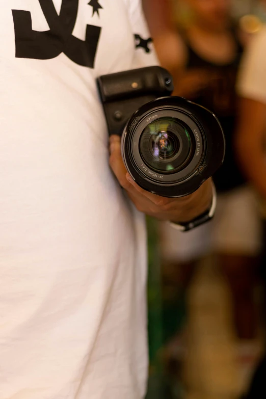 a man with a camera in his hand