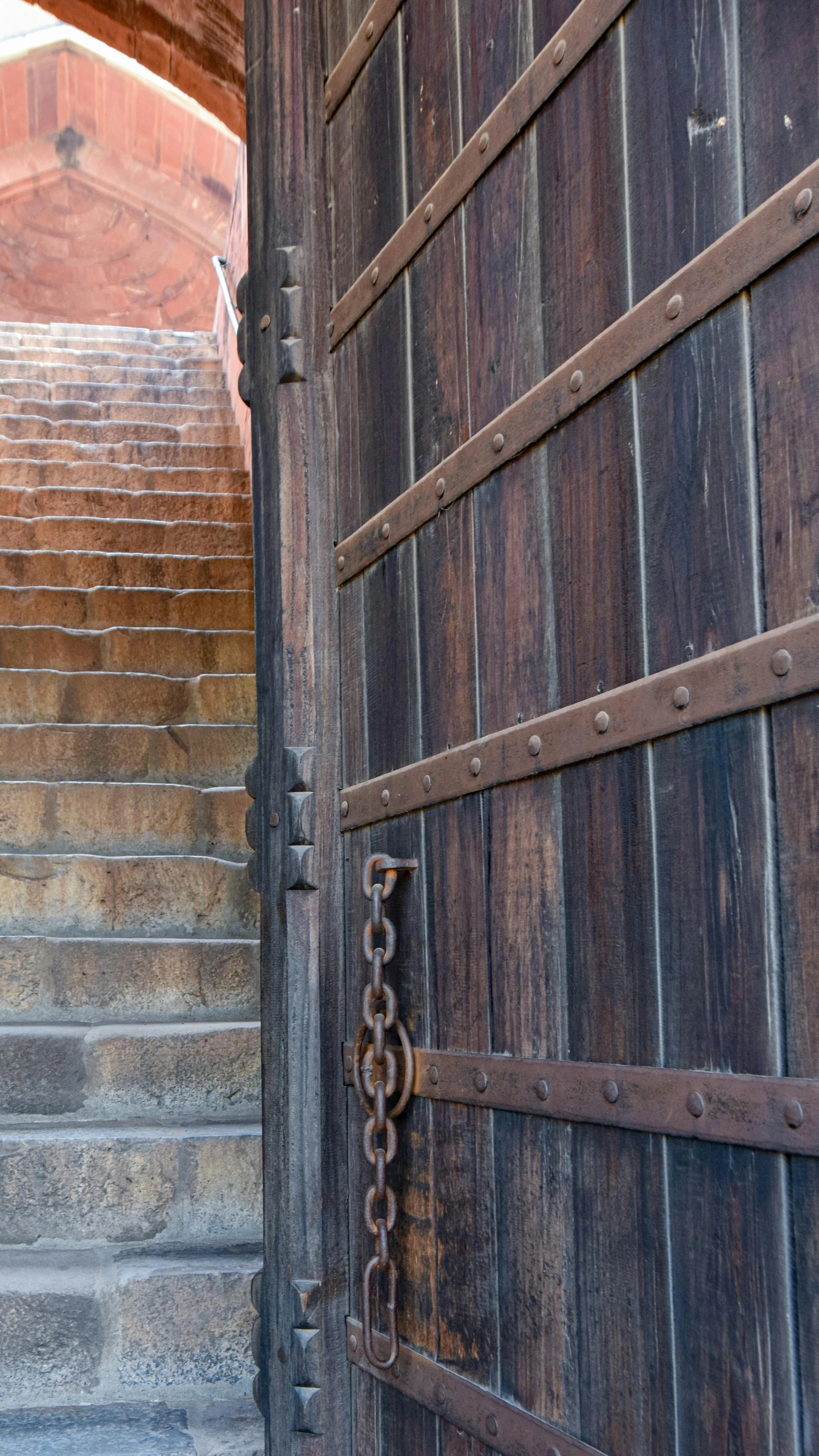 the door is open on an old stone building