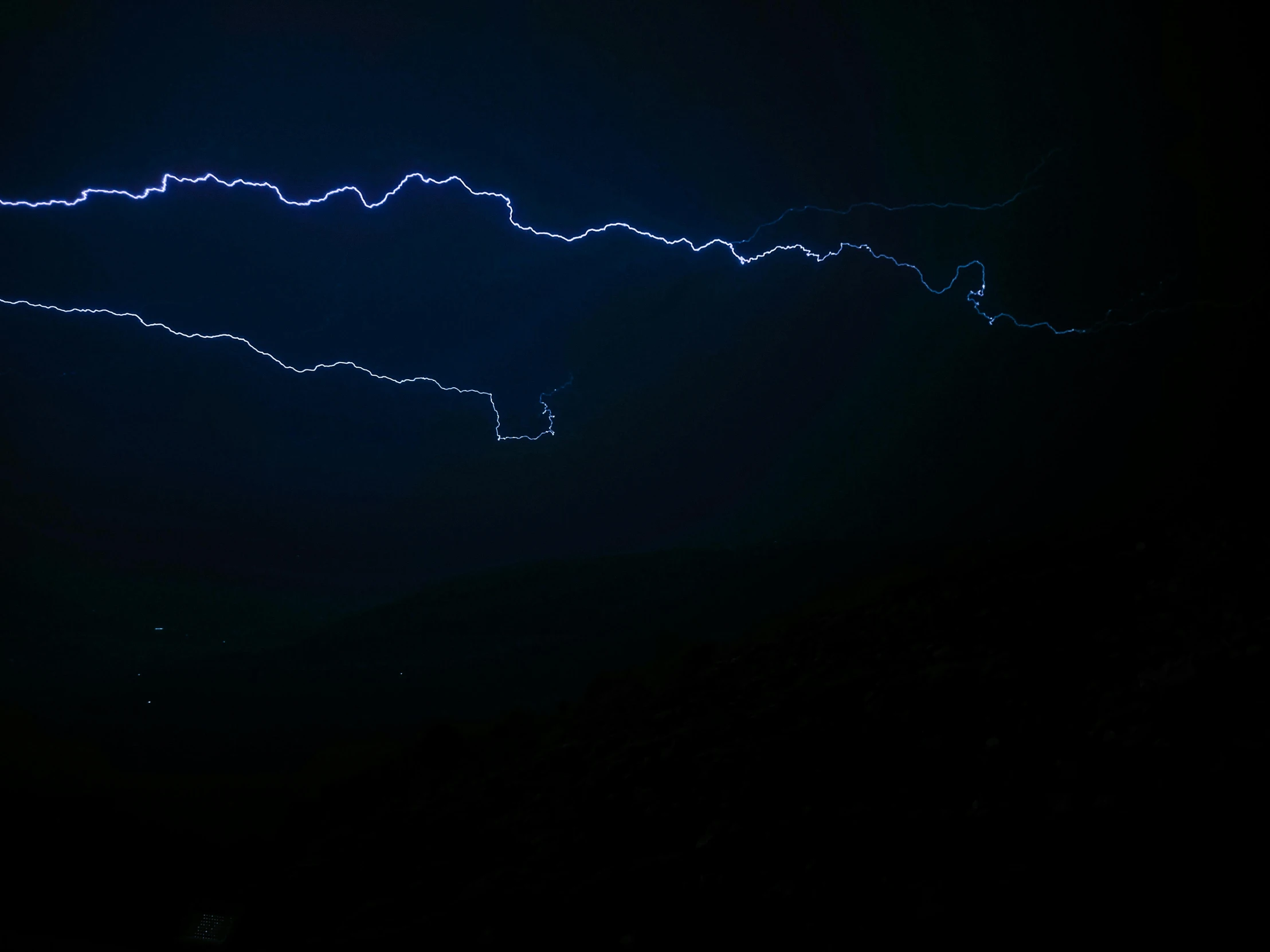 the image is very blurry with this image of lightning