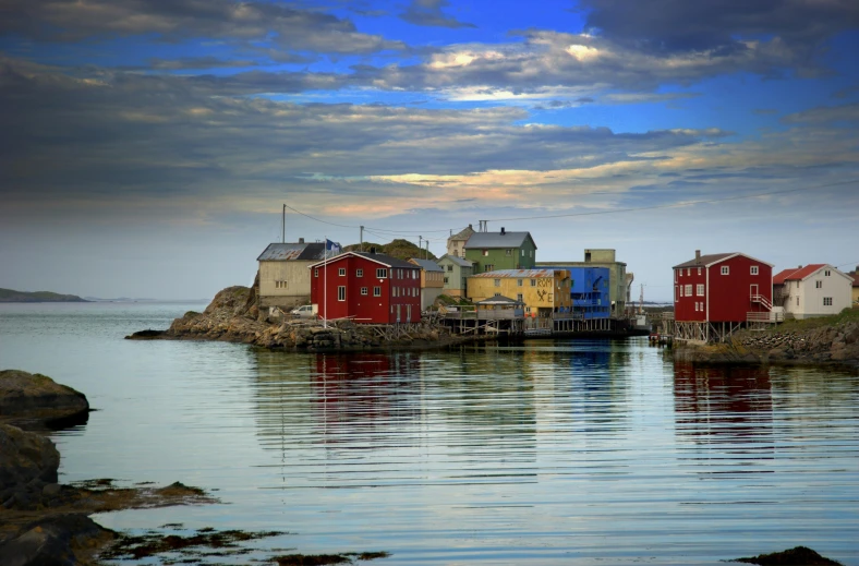 a number of houses near a body of water