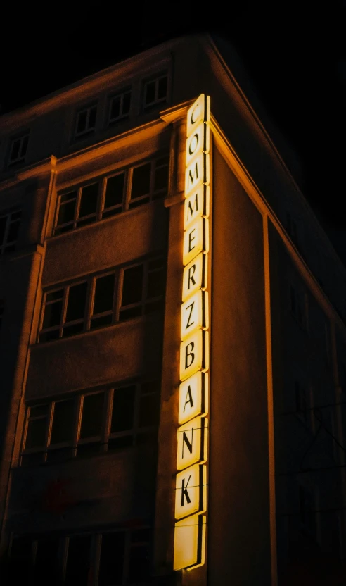 a sign is lit up in a building