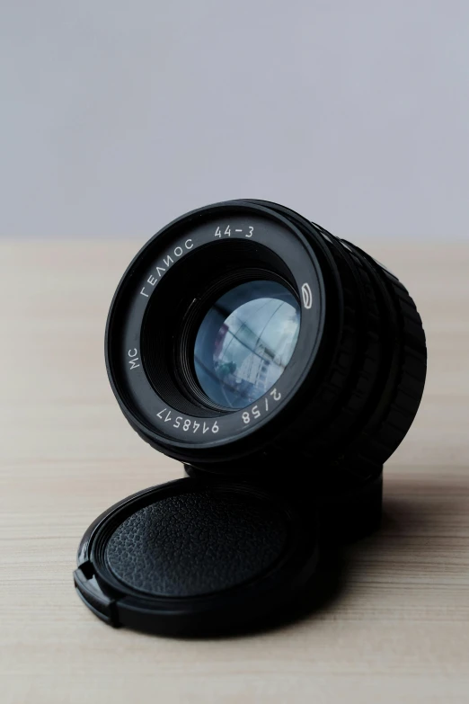 an empty camera lens with some sort of object