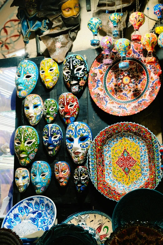 this is a display of colorfully painted plates