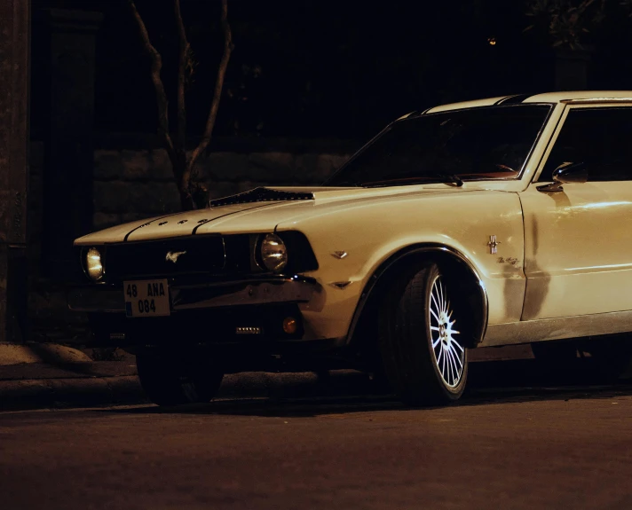 a car parked on the street at night time