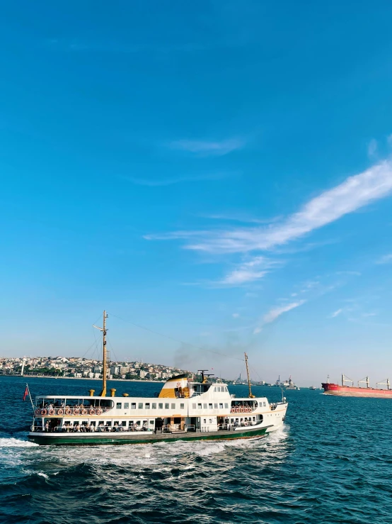 a large boat in a harbor with many ships