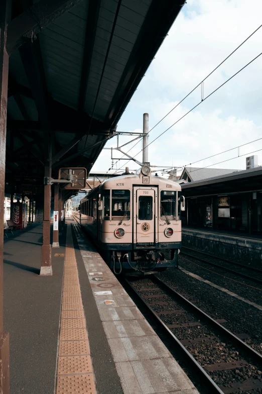 there is a train coming up the track