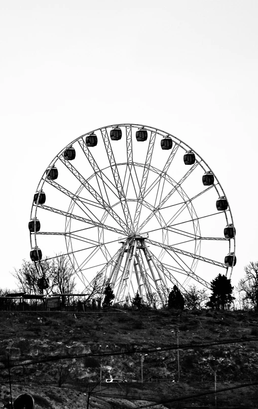 a ferris wheel against a clear sky background