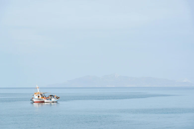 a boat that is in the middle of the ocean