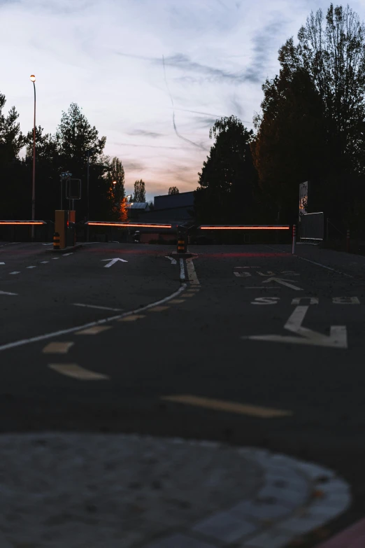 a road has cars driving down the road