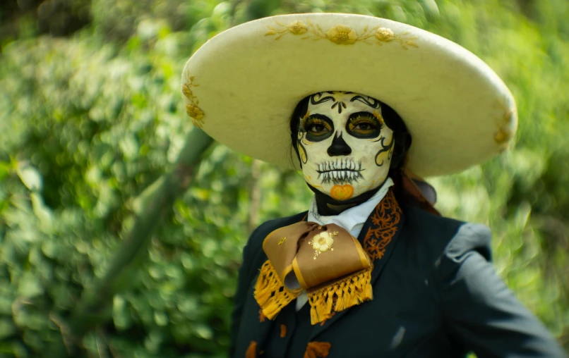 a man with a skeleton face painted on his face