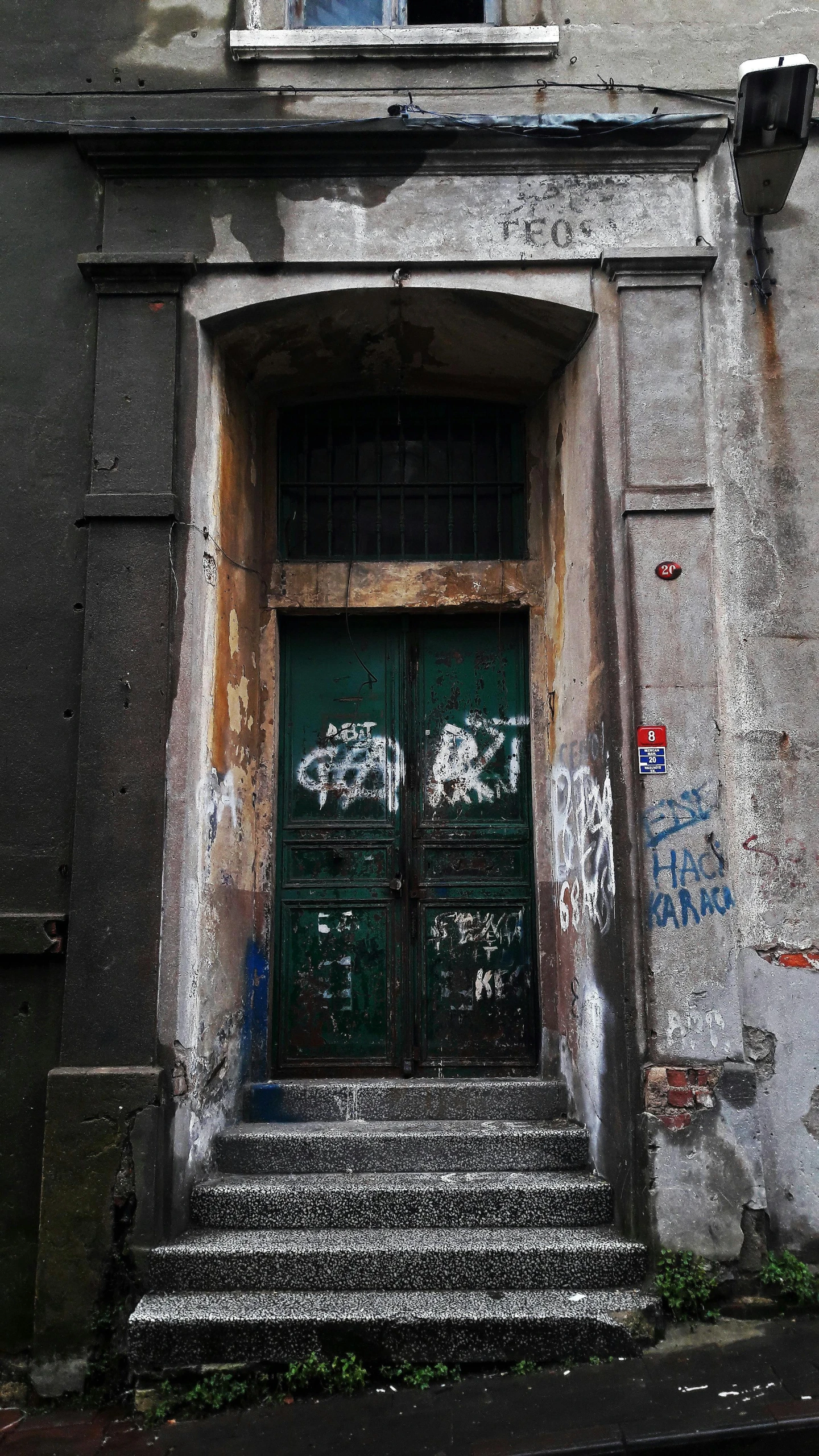 an open door is pictured on the side of a building