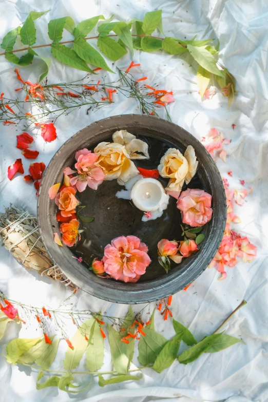 a bowl that has some flowers in it