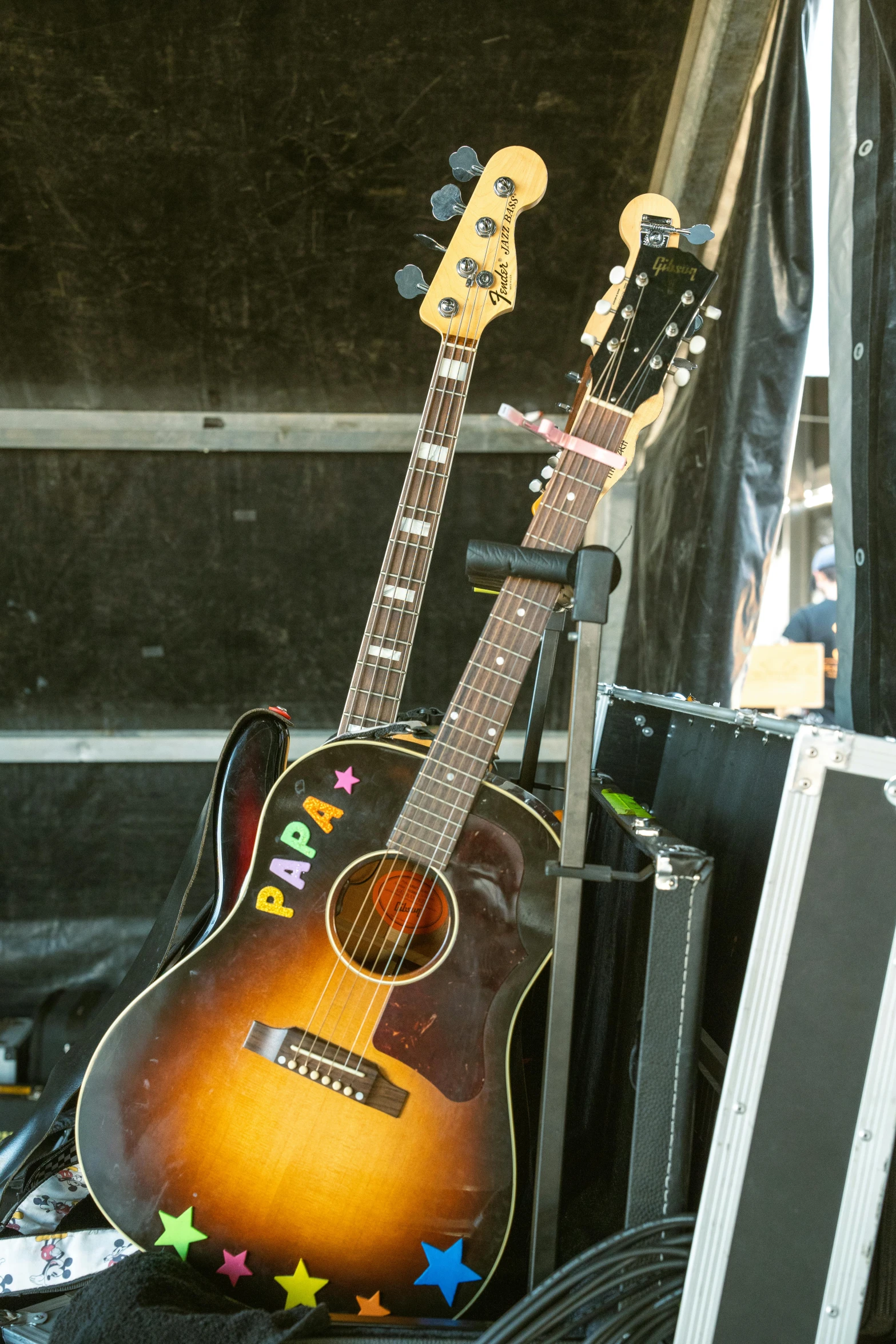 a small guitar and some other musical instruments