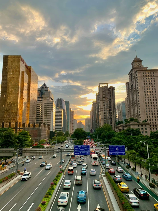 cars and buses are driving on the highway