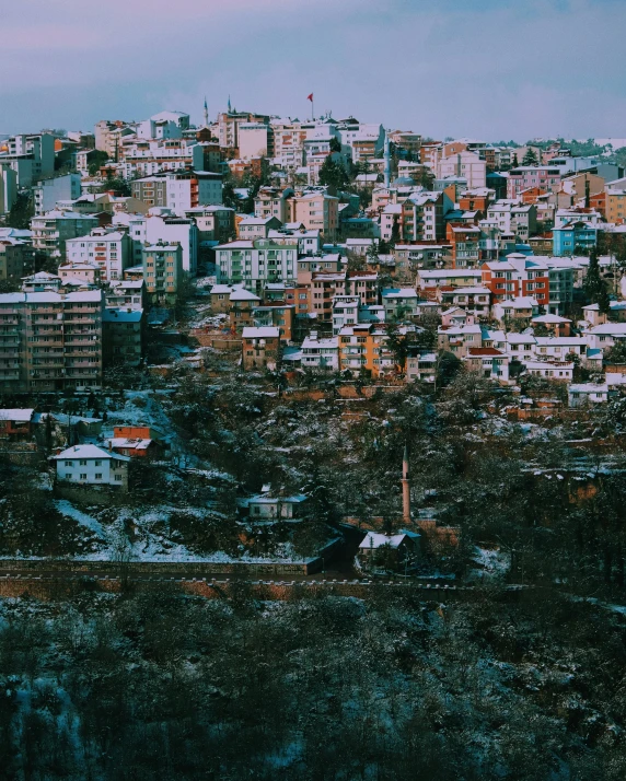 a large city with a clock tower at the top