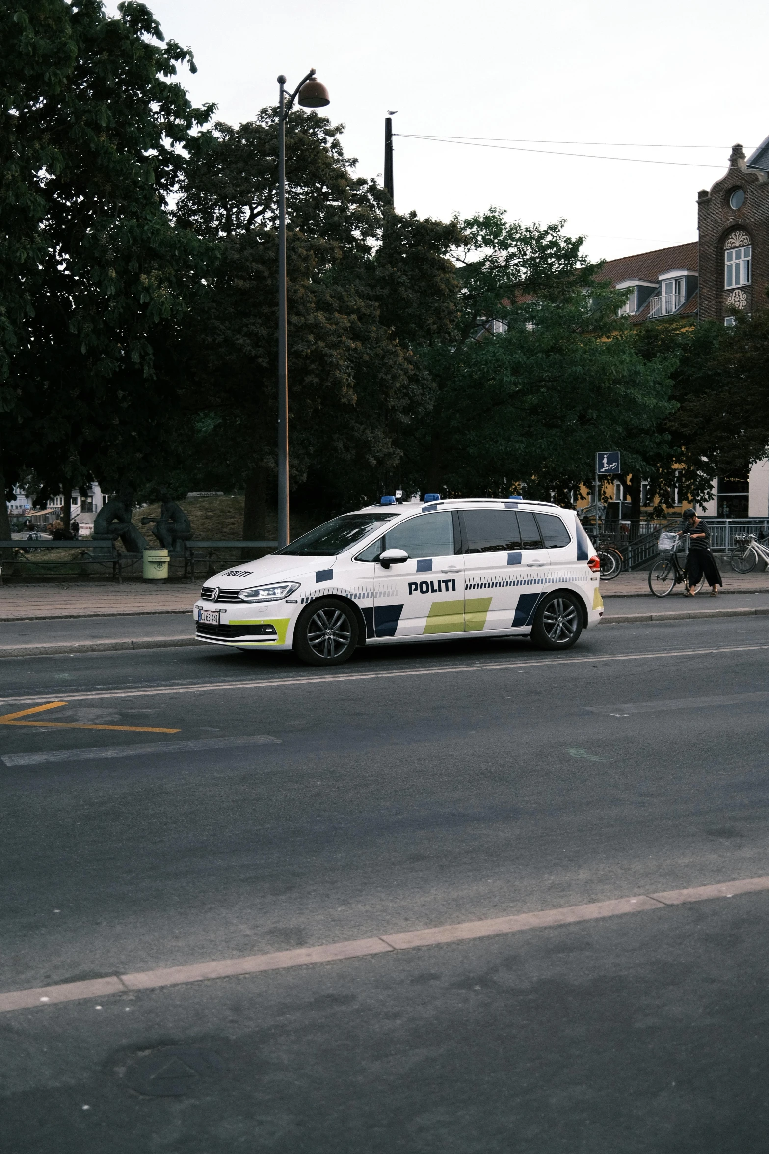 a police car parked on the side of the road