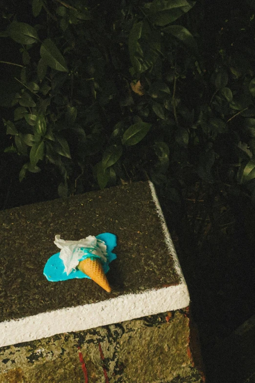 a piece of blue cloth sitting on top of a table