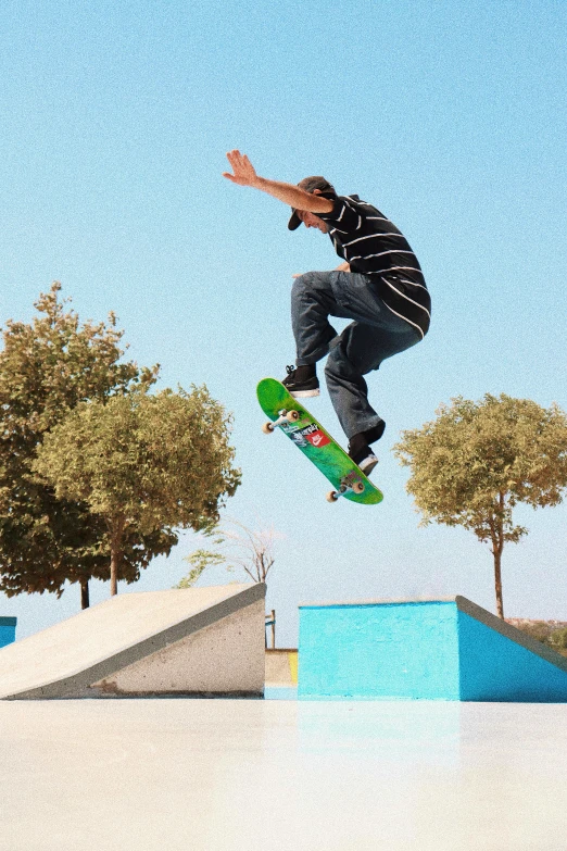 a young man riding a skateboard in the air