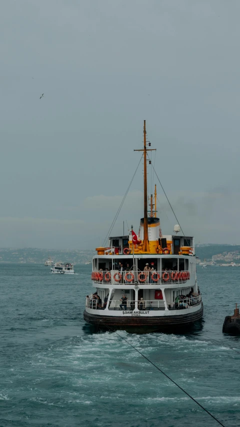 a boat traveling through the ocean on it's side