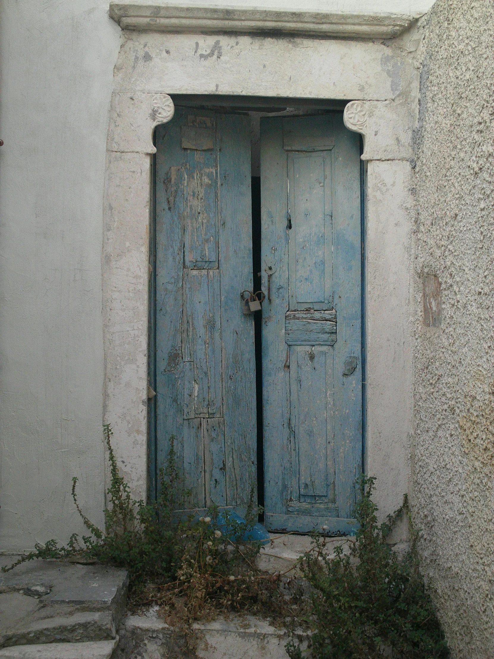 an image of an old door with no frame