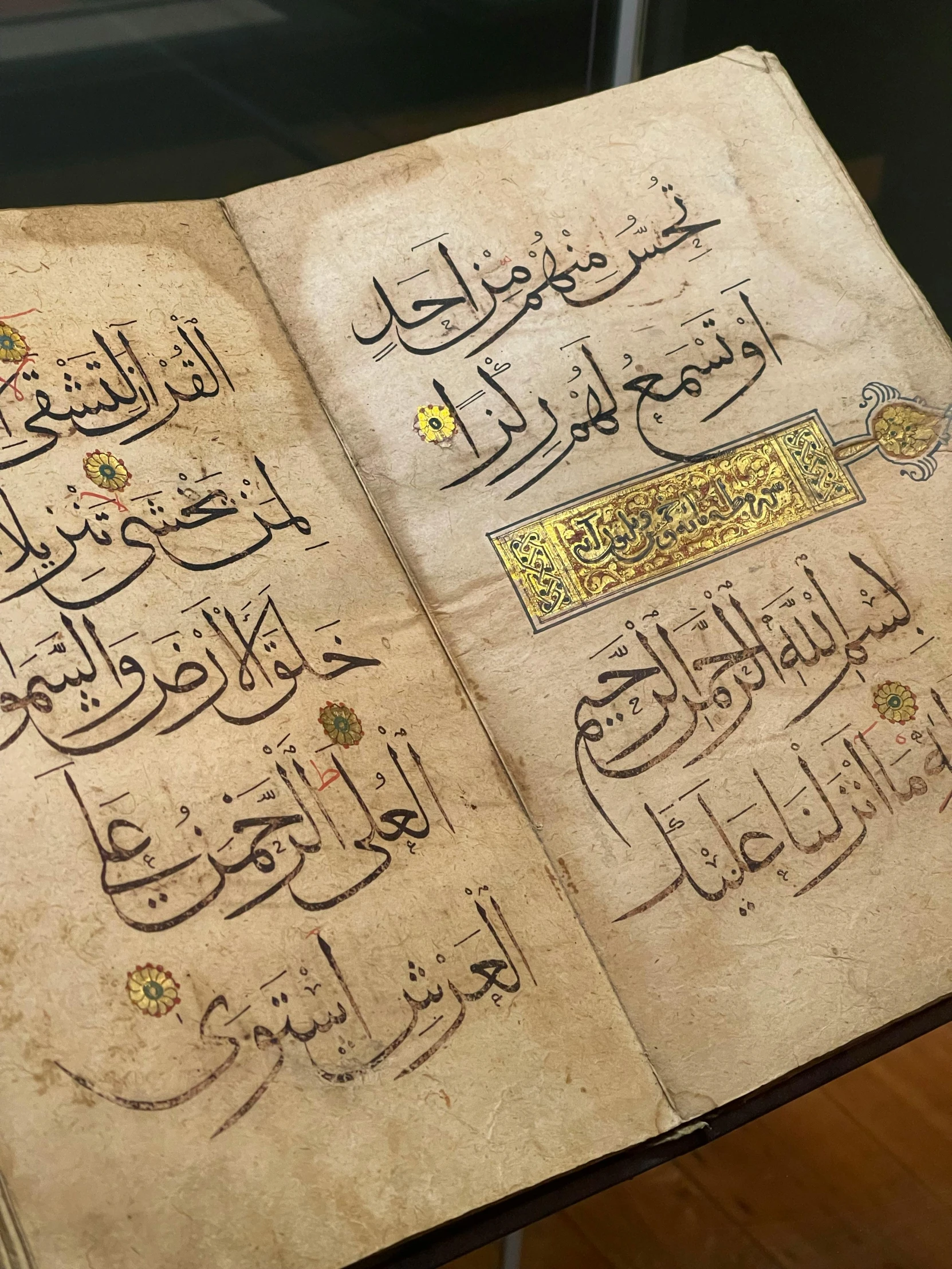 an open book on arabic writing in brown