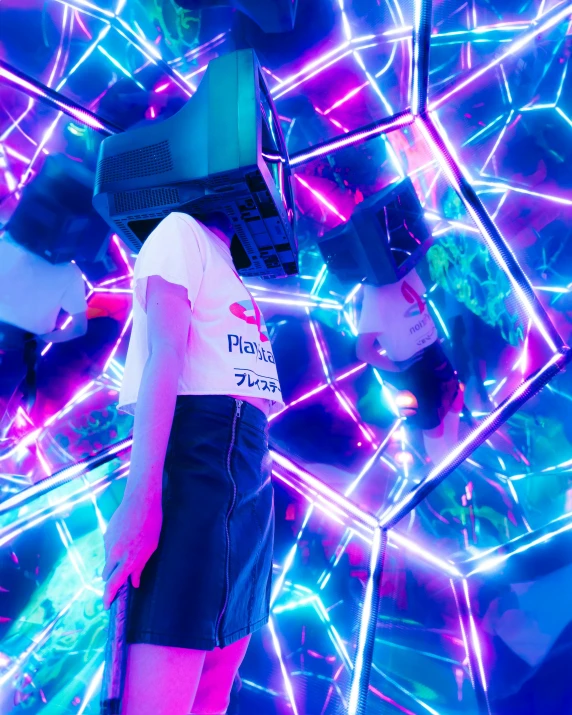 a child's short and t - shirt outfit made of neon light reflecting in a mirrored wall