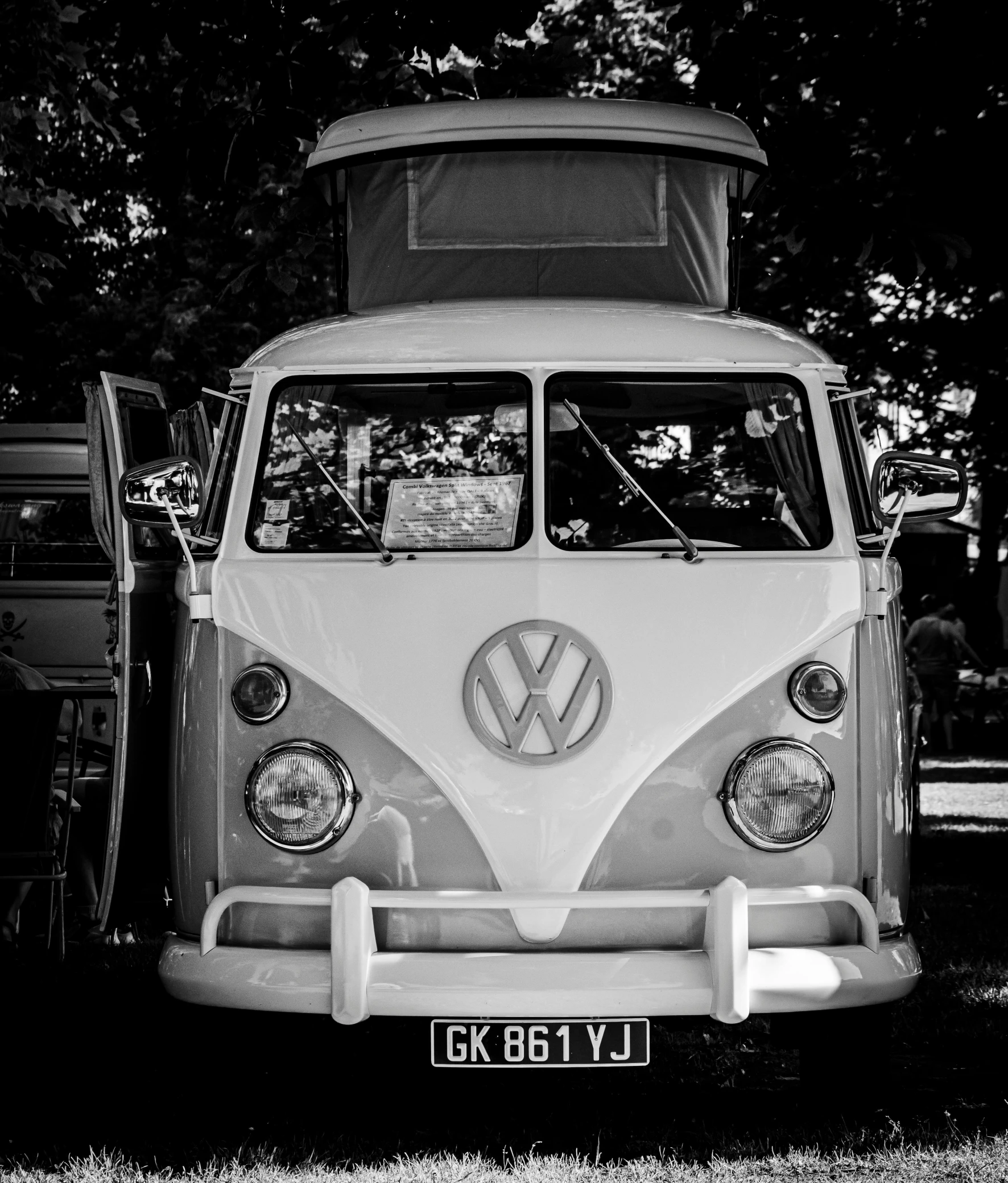 the vw bus has the hood up